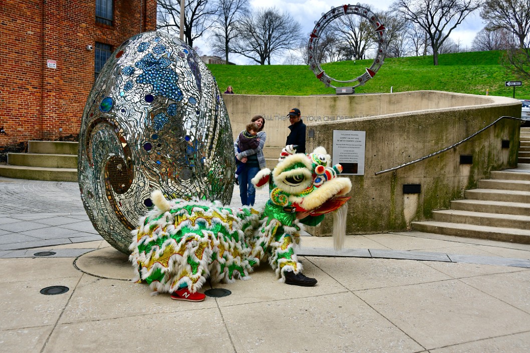 Lion Posing Near the Cosmic Egg