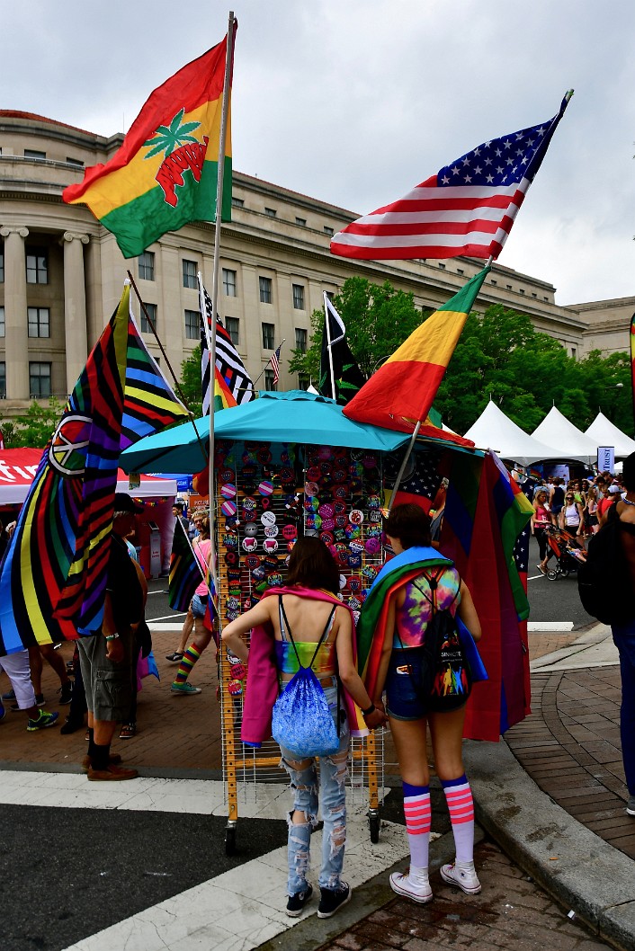 Hands Held at a Colorful Vendor