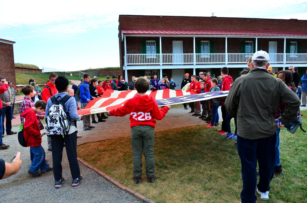 Holding a Flag Flown Over the Fort During WWI Holding a Flag Flown Over the Fort During WWI