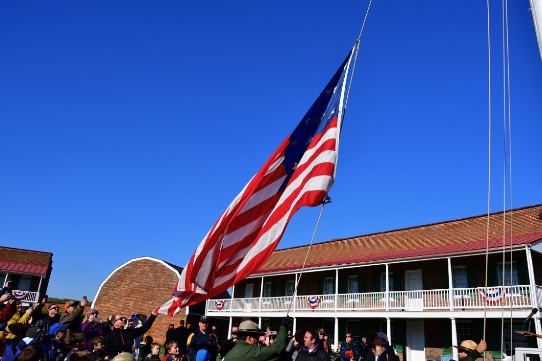 Hoisting the First Flag of the Day