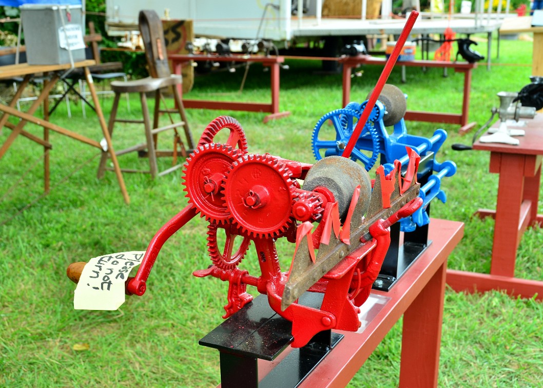 Mechanical Mower Blade Sharpeners in Bright Colors Mechanical Mower Blade Sharpeners in Bright Colors