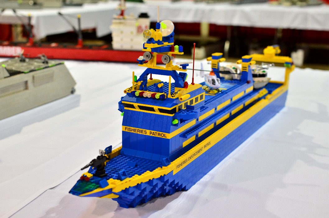 Fisheries Enforcement Patrol Ship in Blue and Yellow Fisheries Enforcement Patrol Ship in Blue and Yellow