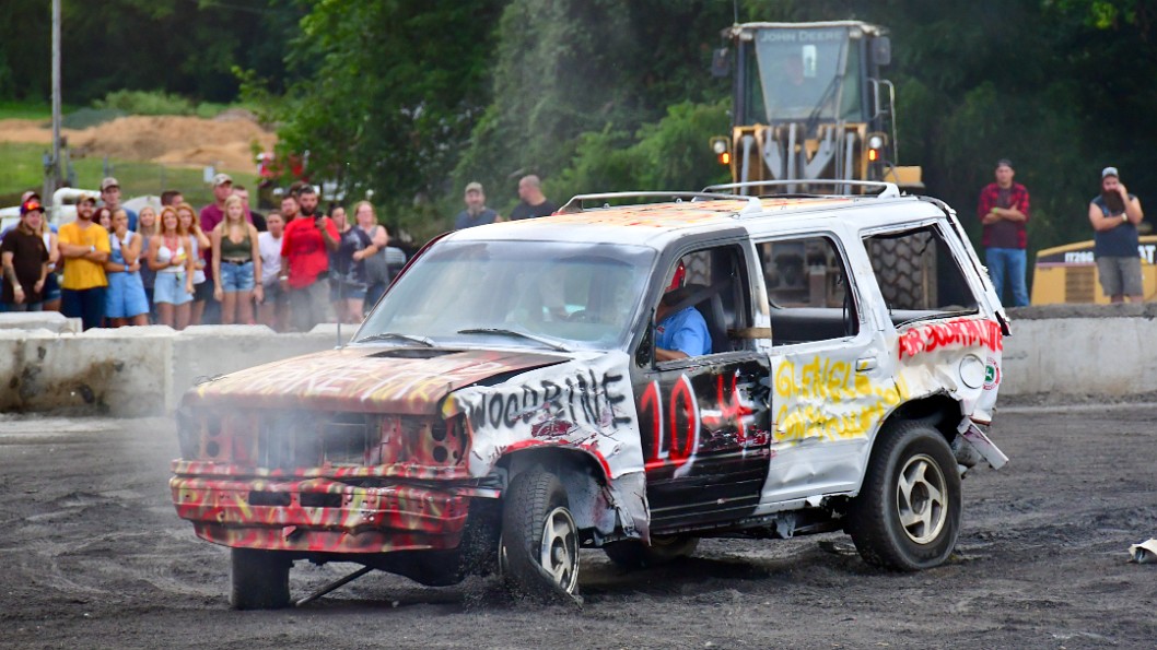 Destroyed Tire and Smoking Engine